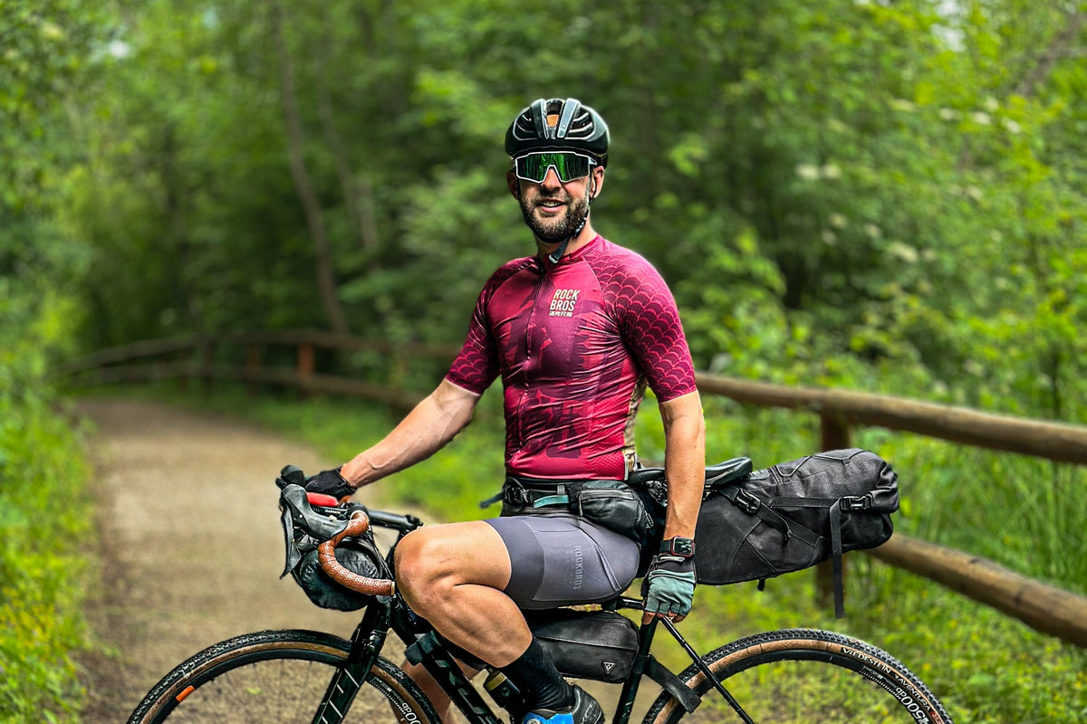 A cyclist riding with a ROCKBROS saddle bag fitted behind the seat