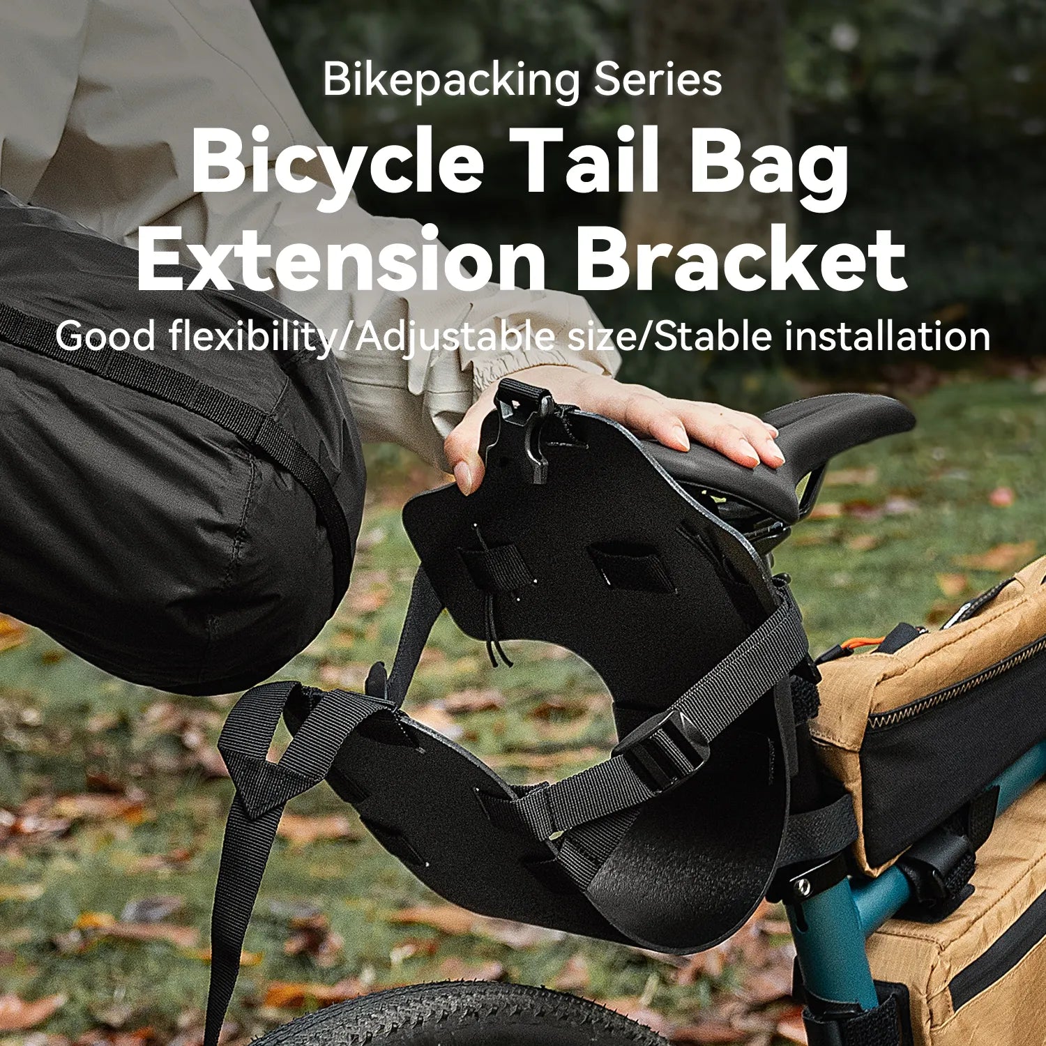 The black rear bag extension bracket is installed on the bicycle outdoors