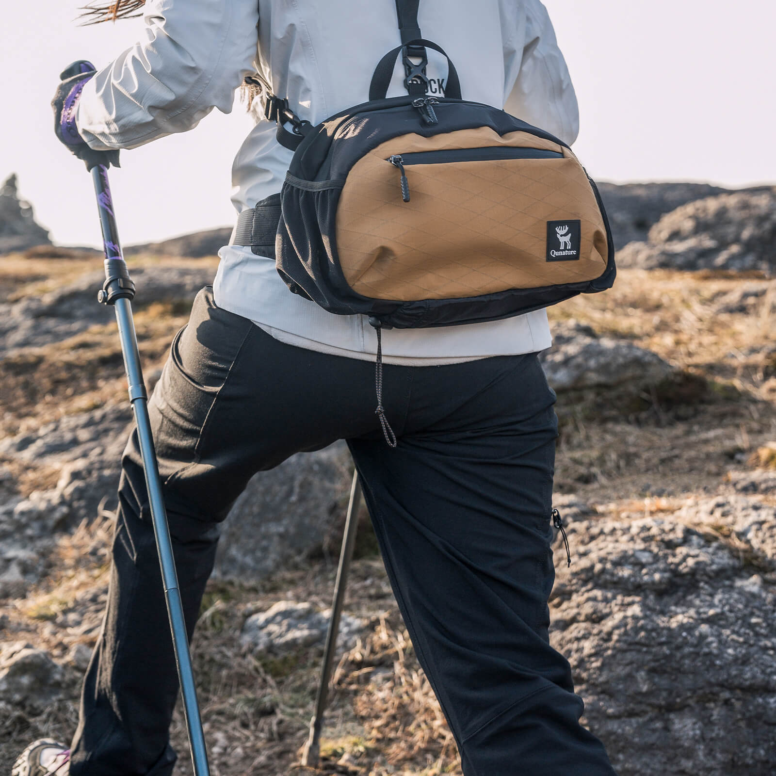 Qunature lightweight foldable trekking poles adjustable from 110 to 130cm, ideal for hiking, walking, and mountain adventures.
