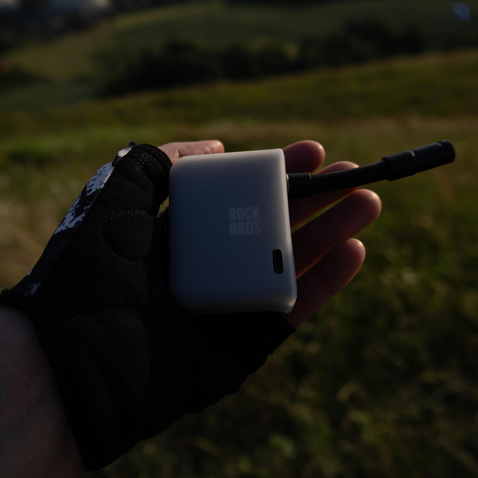 rockbros as1 pro mini electric air pump inflating road tyre to 120 psi, compact design with digital display