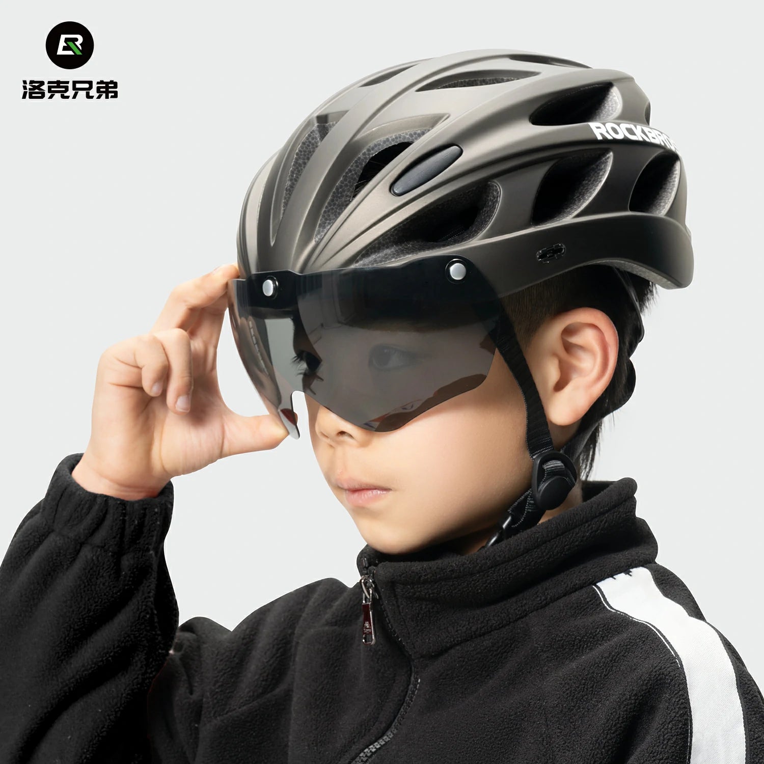 Lightweight adjustable adult cycling helmet in titanium grey