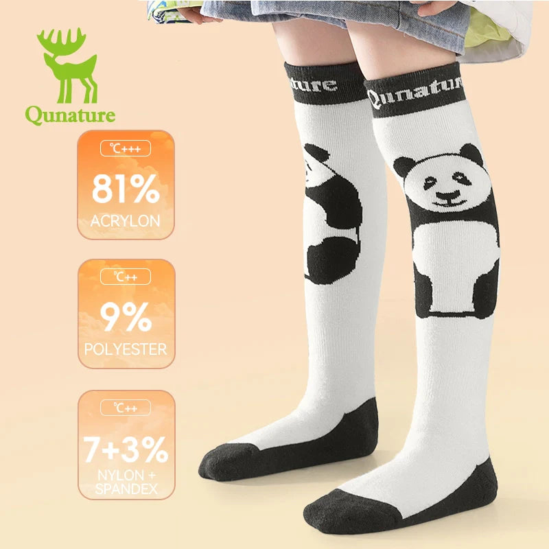 Children's knee-high socks with panda design and Qunature branding on a beige background.