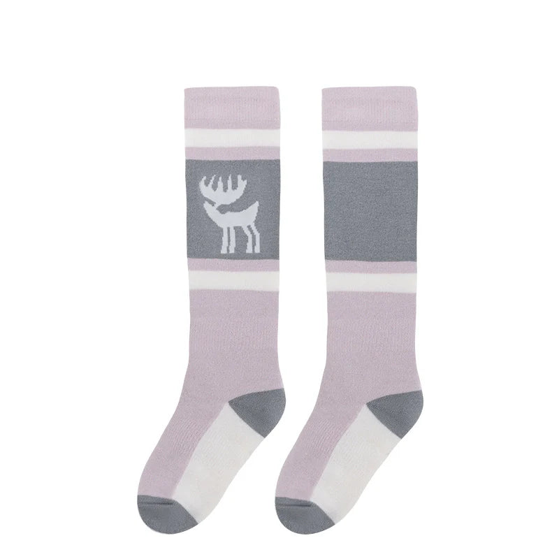 One pair of pink knee-high ski socks with a reindeer pattern#Color_Pink