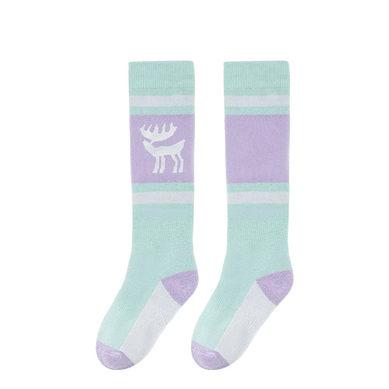 One pair of pink green knee-high ski socks with a reindeer pattern#Color_Pink Green
