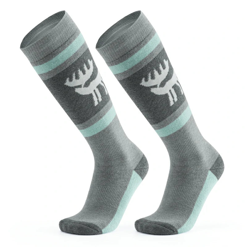 A pair of gray wool ski socks with a striped design and a reindeer logo on the ankle#Color_Gray