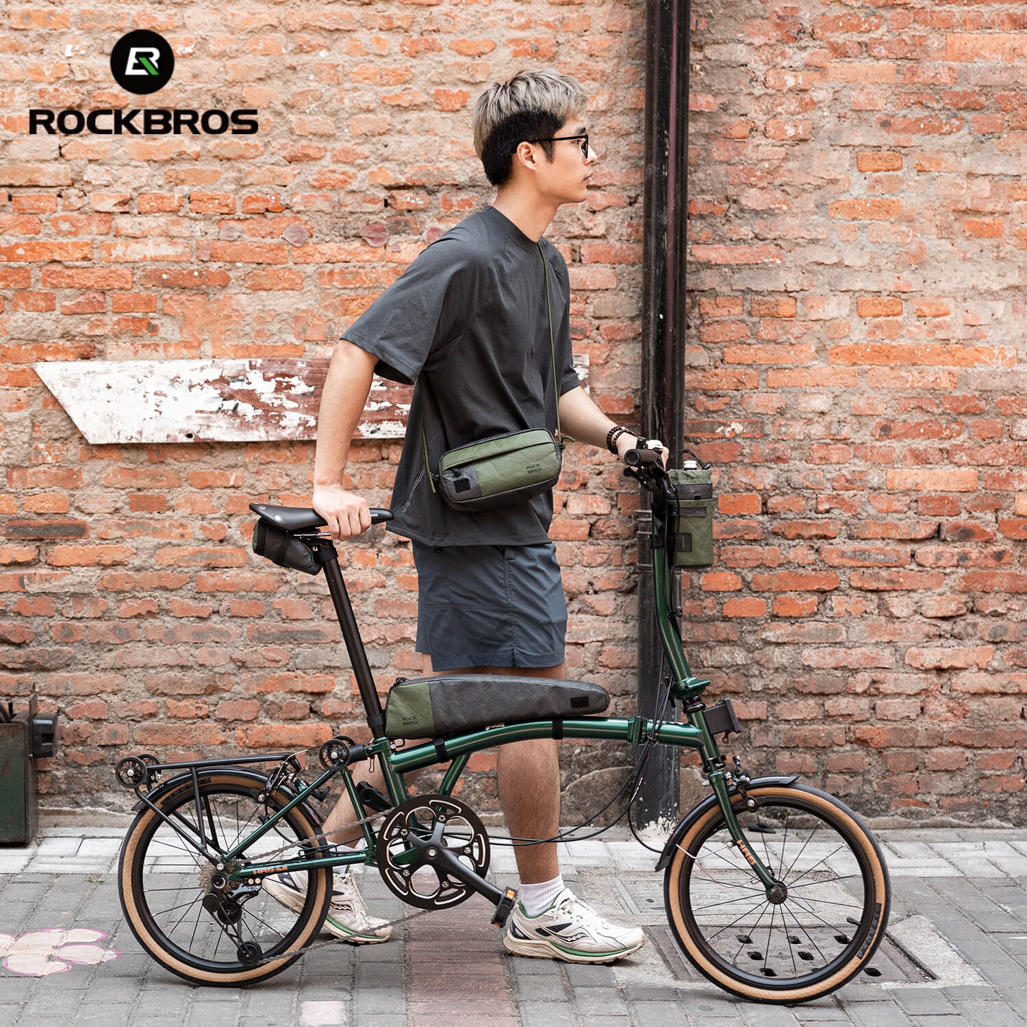 rockbros tyvek handlebar bag with adjustable shoulder strap, reflective logo and zip pockets